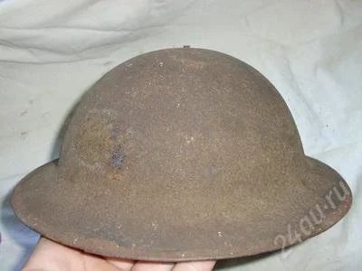 Лот: 2598927. Фото: 1. Шлем броди обр. 1917 на ПМВ и... Обмундирование