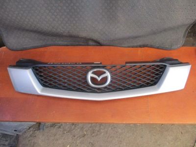 Лот: 14029151. Фото: 1. Решетка радиатора Mazda Demio... Ходовая, подвеска, рулевое управление