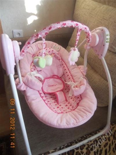 Лот: 2253566. Фото: 1. продам электронную качелю GEOBY... Ходунки, прыгунки, качели