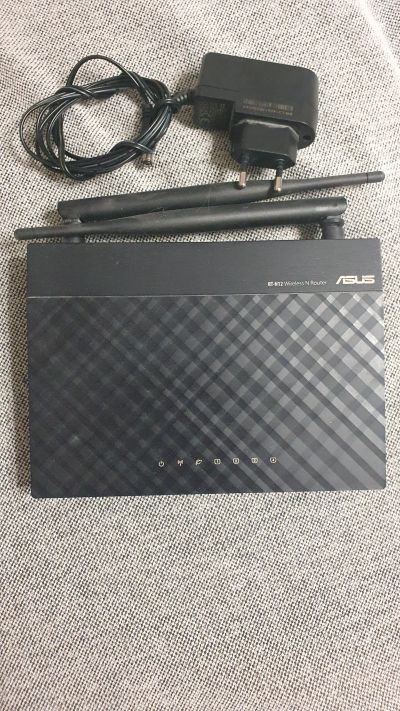 Лот: 24809209. Фото: 1. Wifi роутер asus RT-N12. Маршрутизаторы (роутеры)