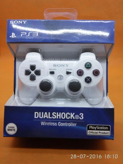 Лот: 7919159. Фото: 1. Джойстик DualShock 3. Новый, белый. Аксессуары, геймпады