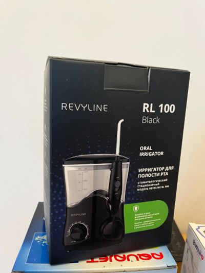 Лот: 20581294. Фото: 1. Ирригатор Revyline RL 100 черный... Уход за полостью рта