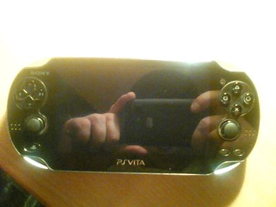 Лот: 6688020. Фото: 1. продам ps vita и 11 игр к ней. Игровые приставки, консоли