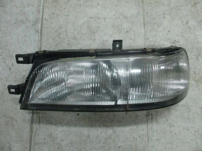 Лот: 14383025. Фото: 1. Фара передняя левая Nissan Laurel... Оптика и освещение