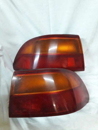 Лот: 10045255. Фото: 1. Задние фонари Honda Ascot innova... Оптика и освещение