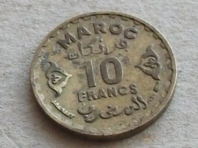 Лот: 19329005. Фото: 1. Монета 10 франк Марокко 1371... Африка