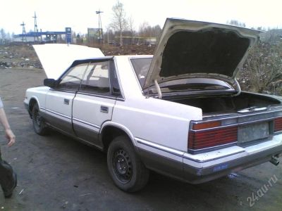 Лот: 13120. Фото: 1. Nissan Laurel Medalist. Красноярск