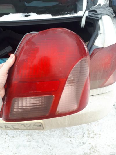 Лот: 15313845. Фото: 1. Фара задняя правая Toyota Platz. Оптика и освещение