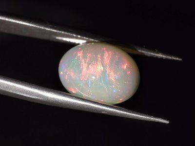 Лот: 21082758. Фото: 1. Кабошон: 2.64 ct. Опал овал (Эфиопия... Драгоценные и поделочные камни