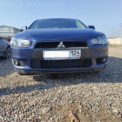Лот: 20315823. Фото: 1. Передний бампер Lancer x дорест... Кузов