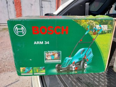 Лот: 19134751. Фото: 1. Электрическая газонокосилка Bosch... Остальная садовая техника