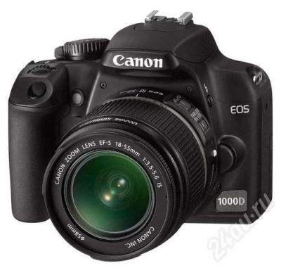 Лот: 498474. Фото: 1. Canon 1000D kit 18-55 mm IS. Цифровые зеркальные