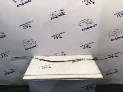 Лот: 21710230. Фото: 1. тросик ручного тормоза Geely Emgrand... Двигатель и элементы двигателя