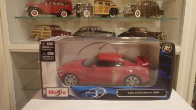 Лот: 15560043. Фото: 1. Масштабная модель 2009 Nissan... Автомоделизм