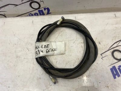 Лот: 21714026. Фото: 1. тросик багажника Hyundai Accent... Двигатель и элементы двигателя
