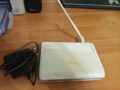Лот: 18112175. Фото: 1. Роутер asus wl-520gu. Маршрутизаторы (роутеры)