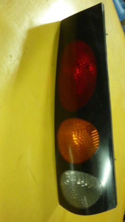 Лот: 3254469. Фото: 1. Фара задняя Toyota Raum. Оптика и освещение