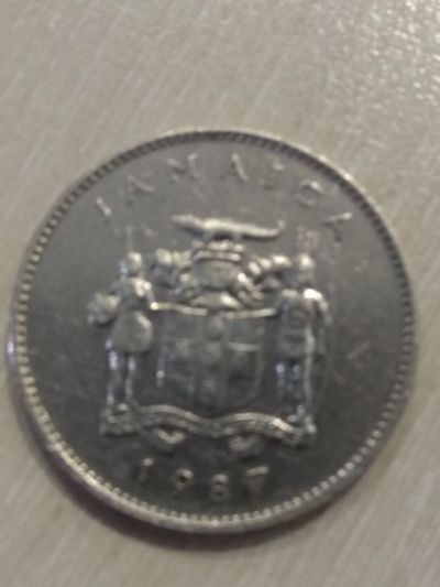 Лот: 19264549. Фото: 1. Ямайка 10 центов 1987г. Америка
