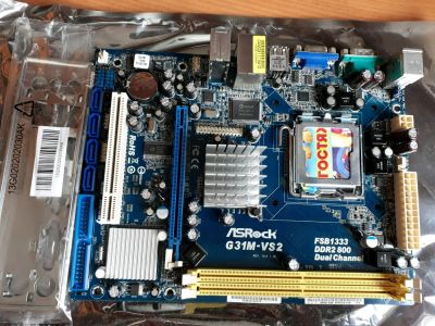 Лот: 11326491. Фото: 1. Asrock G31M-VS2 (s775/ddr2). Материнские платы