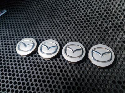 Лот: 18689154. Фото: 1. Колпачки ЦО Mazda. Колпаки