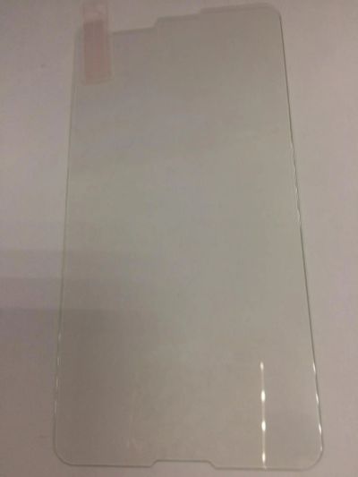 Лот: 9390937. Фото: 1. Защитное стекло Sony Xperia E4g... Защитные стёкла, защитные плёнки