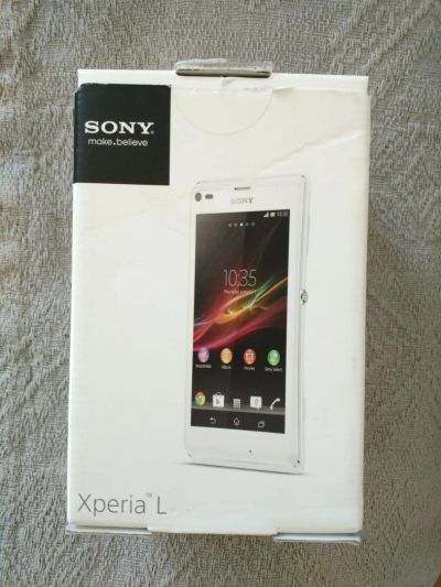 Лот: 7727054. Фото: 1. Sony Xperia L (чёрный). Смартфоны