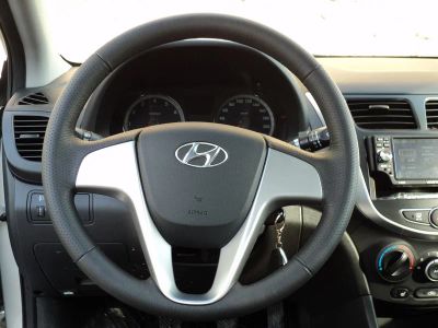 Лот: 7741635. Фото: 1. Кожаная оплетка на руль Hyundai... Чехлы, коврики, оплетки руля