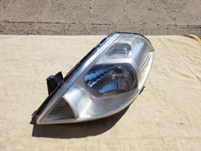 Лот: 25005491. Фото: 1. Фара левая Nissan Tiida C11. Оптика и освещение