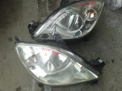 Лот: 4161211. Фото: 1. Фара оригинал Mazda Demio 2005г... Оптика и освещение