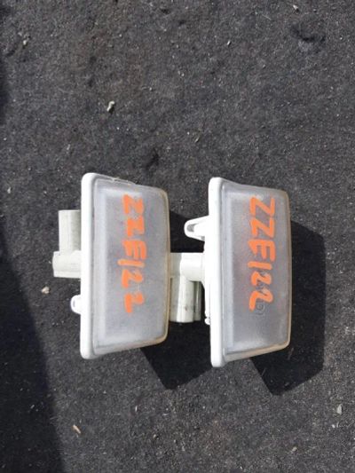 Лот: 21411452. Фото: 1. подсветка номера Toyota Corolla... Двигатель и элементы двигателя