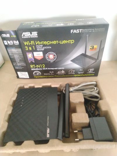 Лот: 18925760. Фото: 1. Wi-Fi роутер ASUS RT-N12. Маршрутизаторы (роутеры)