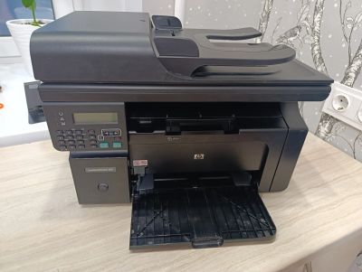 Лот: 25801965. Фото: 1. МФУ принтер HP LaserJet M1212nf... Лазерные принтеры