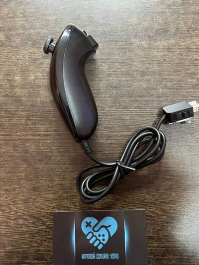 Лот: 16444438. Фото: 1. Контроллер Nunchuk Нунчак для... Аксессуары для игровых приставок, консолей, геймпады