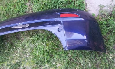 Лот: 11964811. Фото: 1. Бампер задний Mazda Demio 2002-2004... Кузов