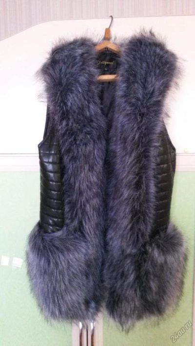 Лот: 8240962. Фото: 1. новая жилетка меховая. Верхняя одежда
