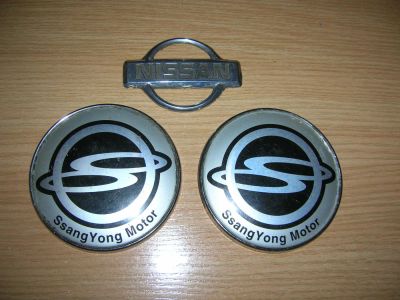 Лот: 9563422. Фото: 1. Шильдики на Ssang Yong и Nissan. Кузов