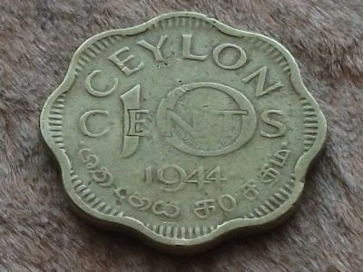 Лот: 11296098. Фото: 1. Монета 10 цент Цейлон 1944 портрет... Азия