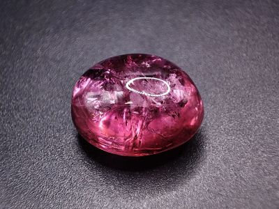Лот: 21038570. Фото: 1. Кабошон: 24.05 ct. Турмалин Рубеллит... Драгоценные и поделочные камни
