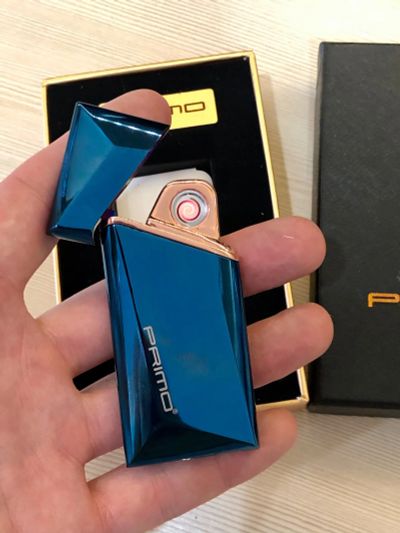 Лот: 19151525. Фото: 1. Зажигалка USB Primo Blue. Зажигалки, спички, пепельницы