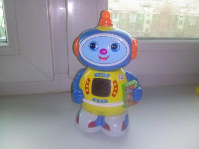 Лот: 7084066. Фото: 1. Игрушка музыкальный робот. Музыкальные