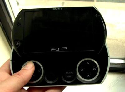 Лот: 1009467. Фото: 1. psp go n1008 black 16gb + 8gb... Игровые приставки, консоли