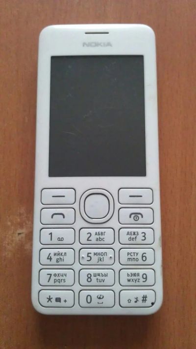 Лот: 4789368. Фото: 1. NOKIA 206 White. Кнопочные мобильные телефоны