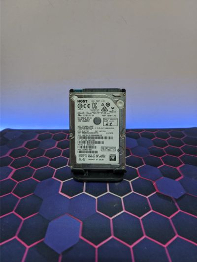 Лот: 25315807. Фото: 1. Жесткий диск 1Tb/2.5"/5400/HGST... Жёсткие диски (HDD)