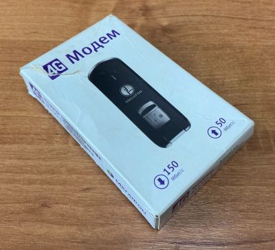 Лот: 20296140. Фото: 1. USB 4G модем Megafon M150-1. Беспроводные модемы