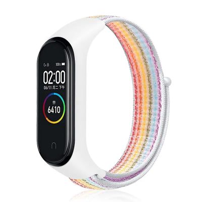 Лот: 25520291. Фото: 1. Ремешок нейлоновый для Mi Band... Смарт-часы, фитнес-браслеты, аксессуары