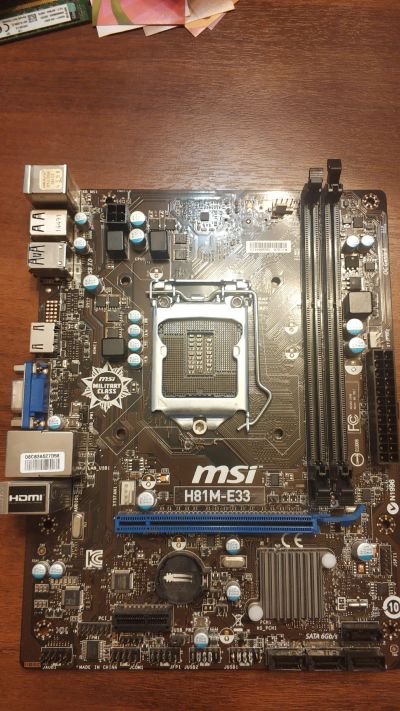 Лот: 16340510. Фото: 1. Материнская плата MSI H81M-E33. Материнские платы