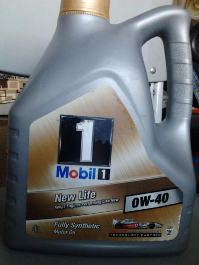 Лот: 5562645. Фото: 1. Моторное масло Mobil 1 0W-40... Масла, жидкости
