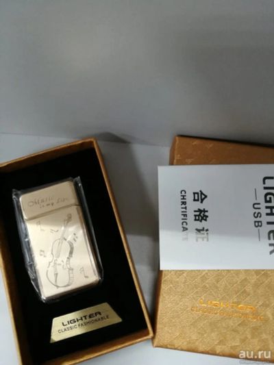 Лот: 13242664. Фото: 1. USB зажигалка с гитарой. Зажигалки, спички, пепельницы