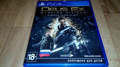 Лот: 12680338. Фото: 1. Deus ex mankind divided PS4... Игры для консолей