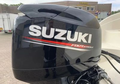 Лот: 25362801. Фото: 1. 4x-тактный лодочный мотор SUZUKI... Лодочные моторы